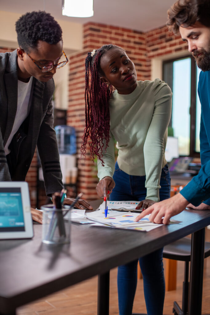Female manager speaking to employees